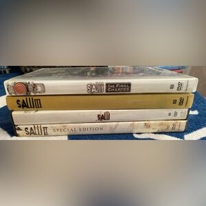 4 SAW DVDs